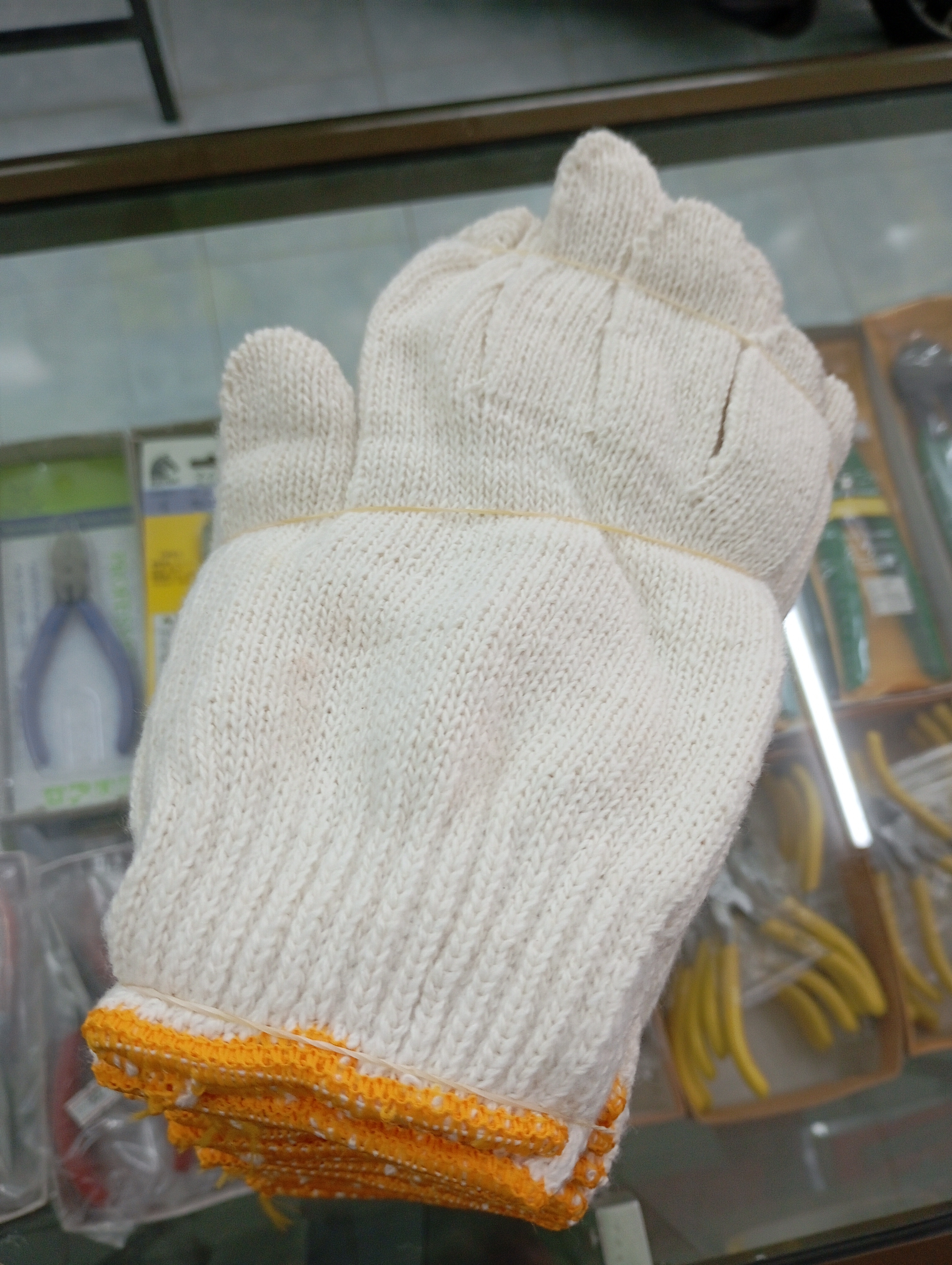 ถุงมือขอบเหลืองหนา 7ขีด จำหน่ายเป็นโหล