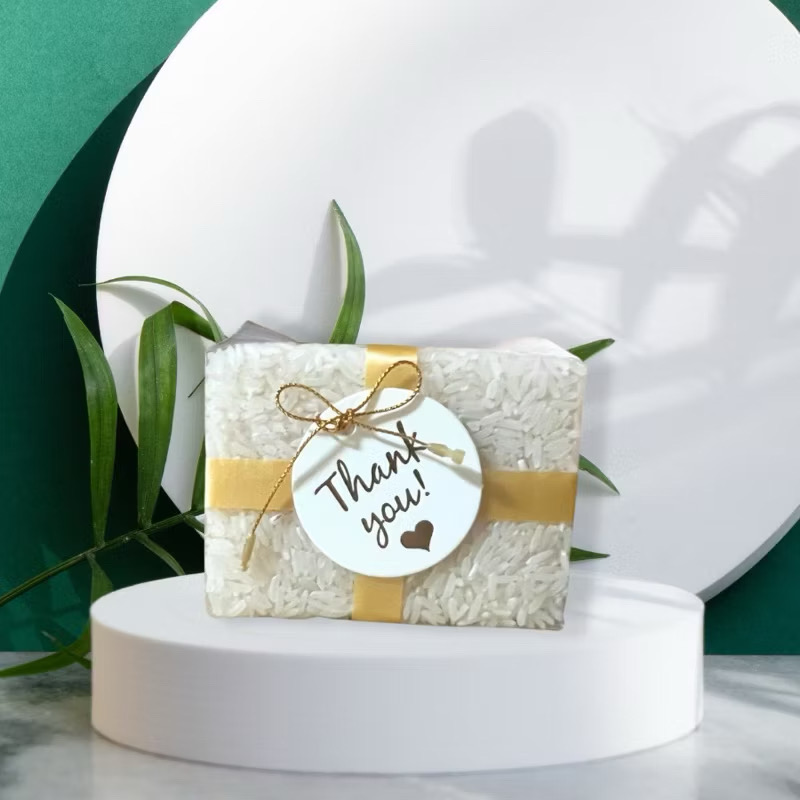 ของชำร่วยงานแต่ง งานมงคล ข้าวหอมมะลิสุรินทร์ ข้าวสารใส่บาตร ของแจกปีใหม่ ของขวัญมงคล (200 กรัม)