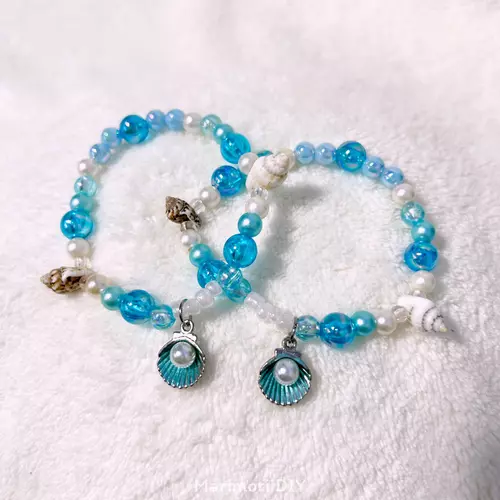 กำไลลูกปัด Blue Lagoon โทนทะเล สีฟ้า เปลือกหอย ไข่มุก สร้อยข้อมือแฮนด์เมด - MarimoriiDIY